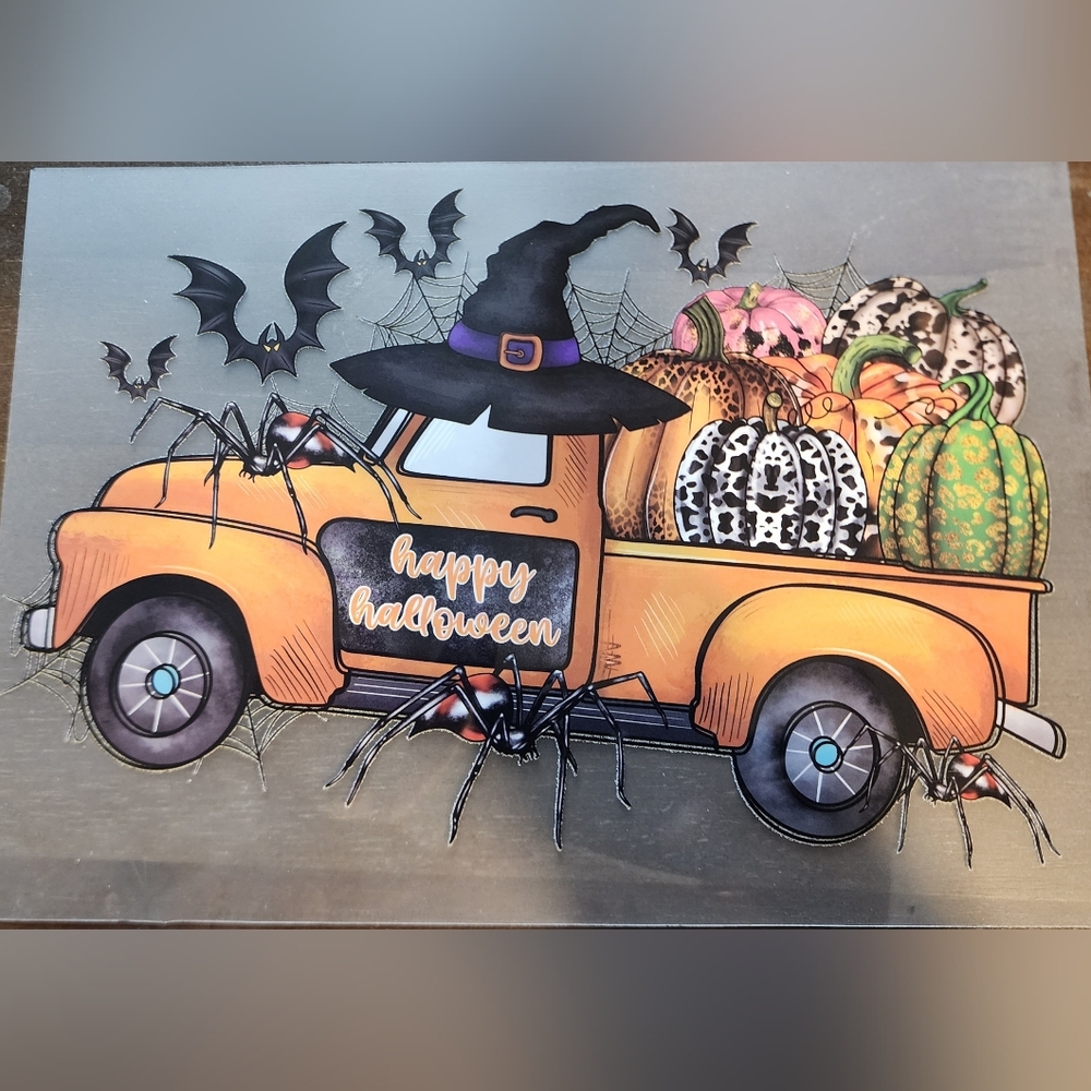 Halloween Truck Decor with Pumpkins and Spiders